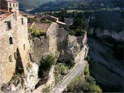 Medieval village of Minerve perched on the rocks above the river Cesse